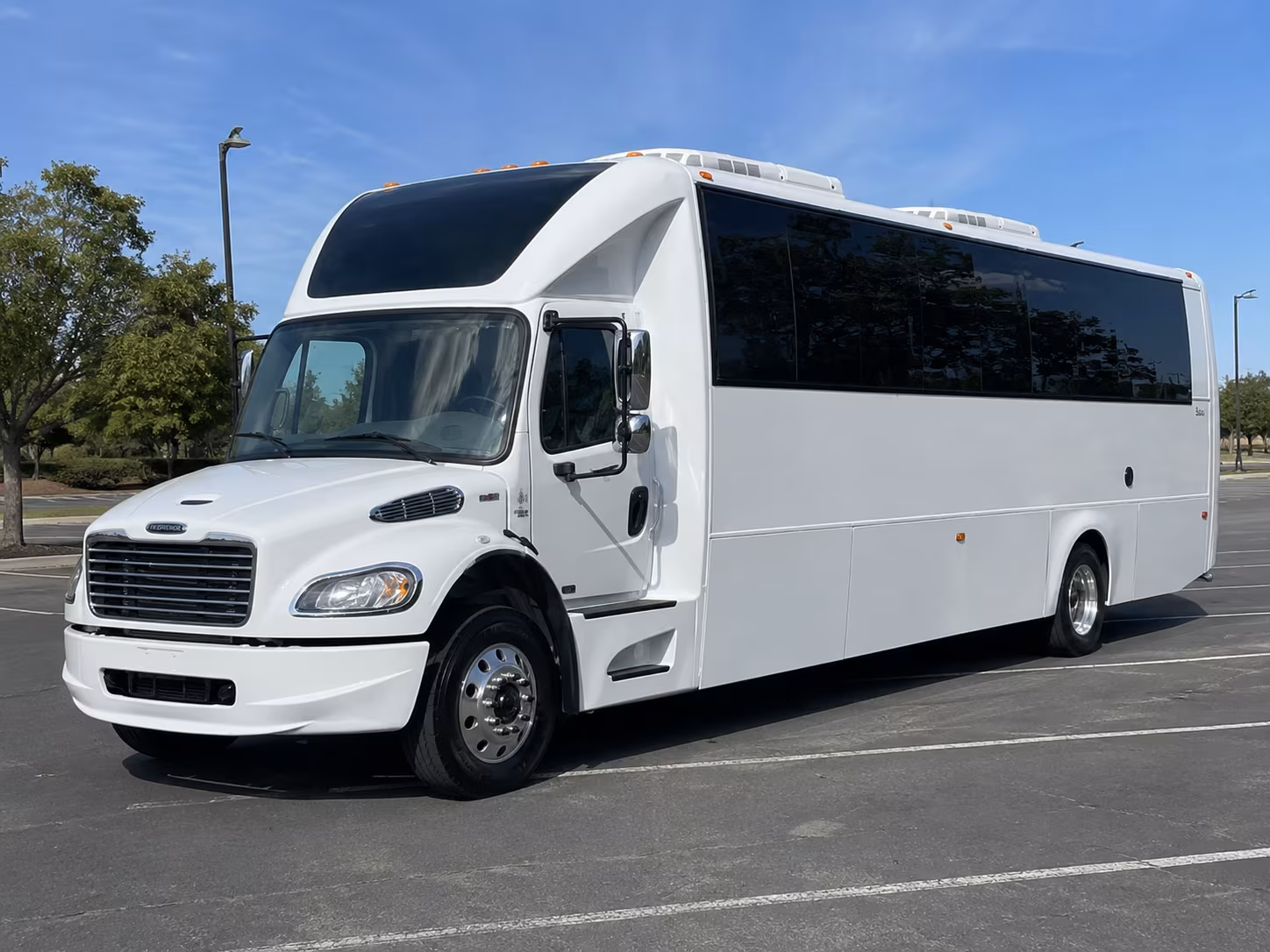 Wedding guests seated inside a party bus serving Visalia